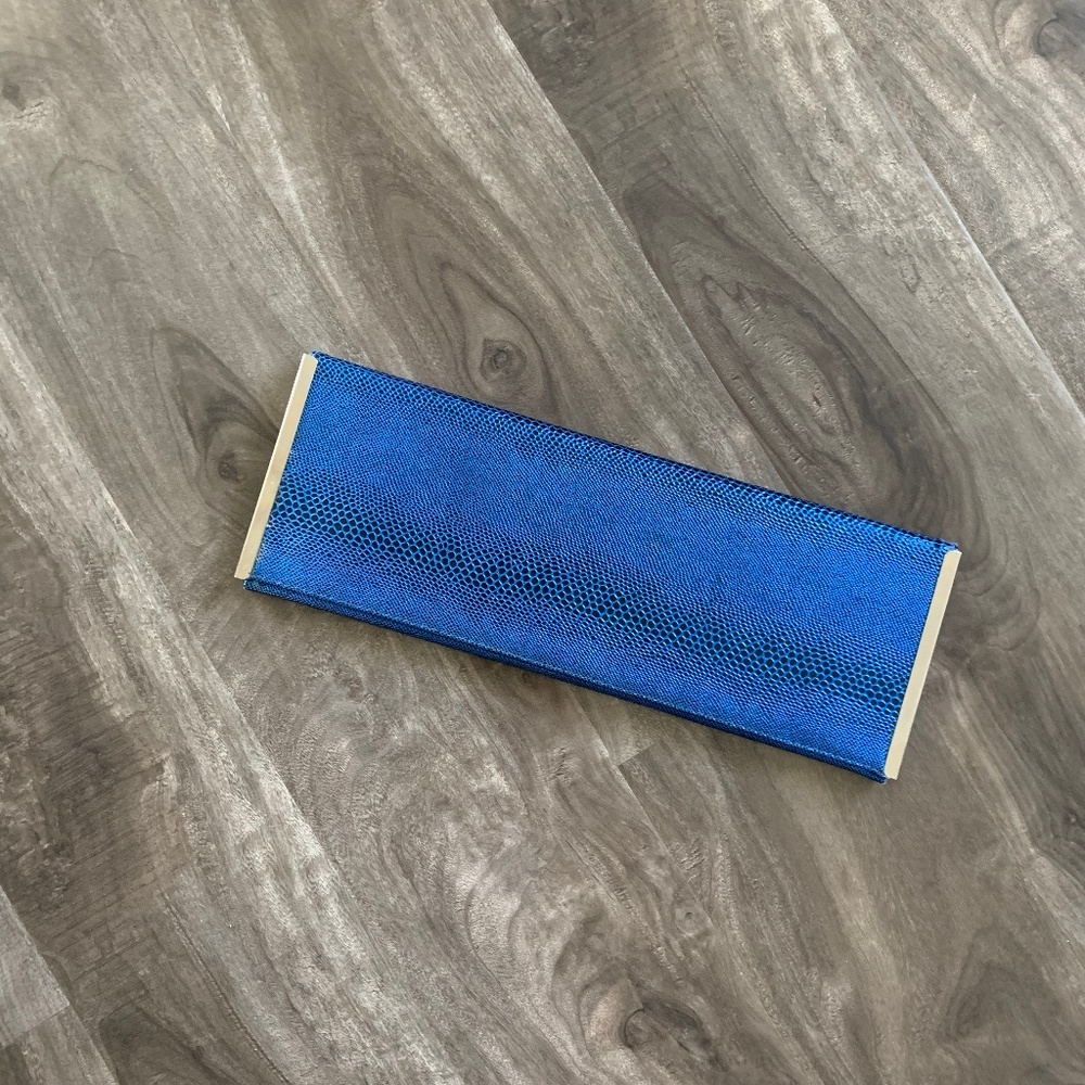 Blue snake print clutch